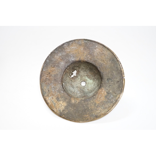 492 - An early Islamic bronze and copper inlaid shield boss, 14.5cm