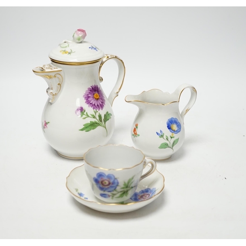 496 - A 20th century Meissen coffee set with floral decoration, comprising a coffee pot, a milk jug, a lid... 