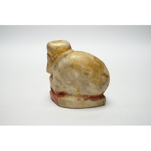 504 - An Indian carved and painted alabaster model of an elephant, 10cm tall