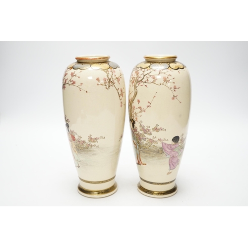 505 - A pair of Japanese Satsuma pottery vases, early 20th century, 22cm