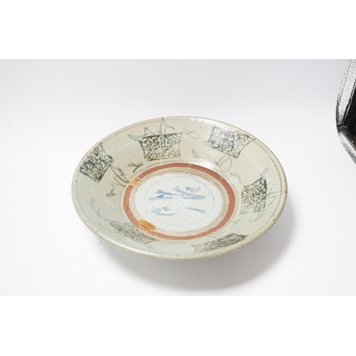 512 - A Chinese famille rose dish, 23cm two similar bowls and a kitchen Qing dish, all late 19th/early 2... 