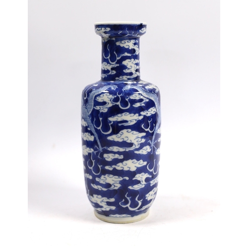 515 - A Chinese blue white dragon rouleau vase, Kangxi mark, late 19th century, 21cm high