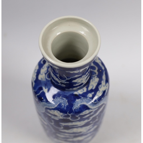 515 - A Chinese blue white dragon rouleau vase, Kangxi mark, late 19th century, 21cm high