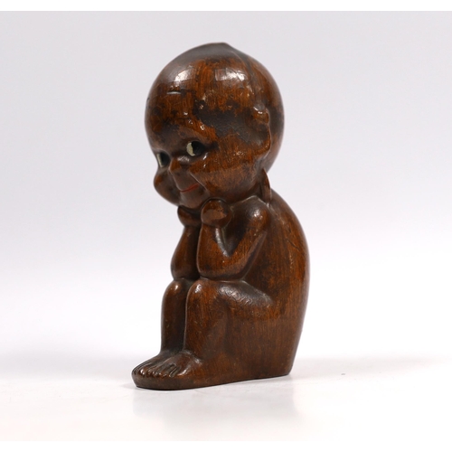 517 - A Kewpie composition figure with painted eyes, 14cm high