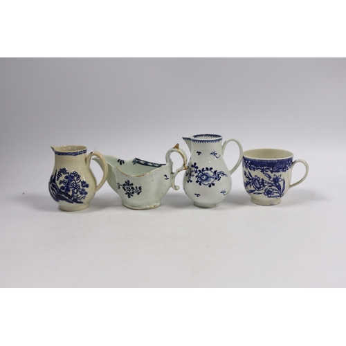 522 - Christian or Pennington, Liverpool porcelain - a sauceboat, two milk jugs and a coffee cup, largest ... 