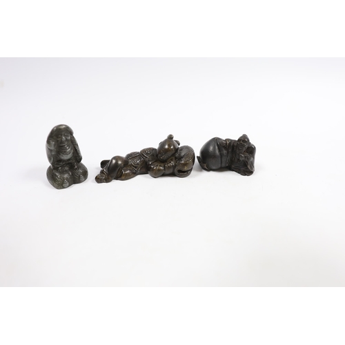 542 - Two 19th century Japanese bronze scroll weights and an antimony figure, largest 7cm