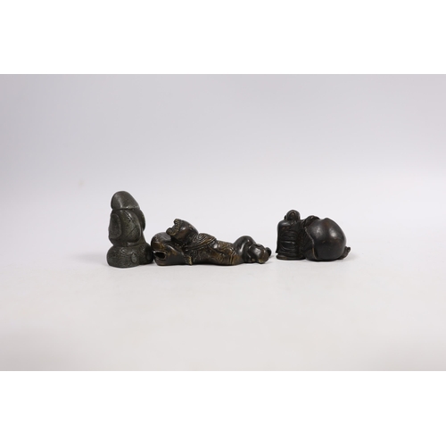 542 - Two 19th century Japanese bronze scroll weights and an antimony figure, largest 7cm