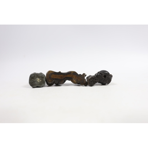 542 - Two 19th century Japanese bronze scroll weights and an antimony figure, largest 7cm