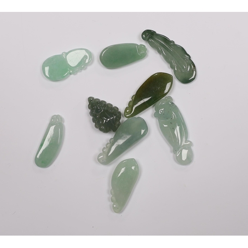 546 - Ten various Chinese carved jadeite pendants