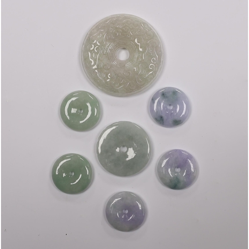 549 - Seven Chinese carved jadeite bi discs