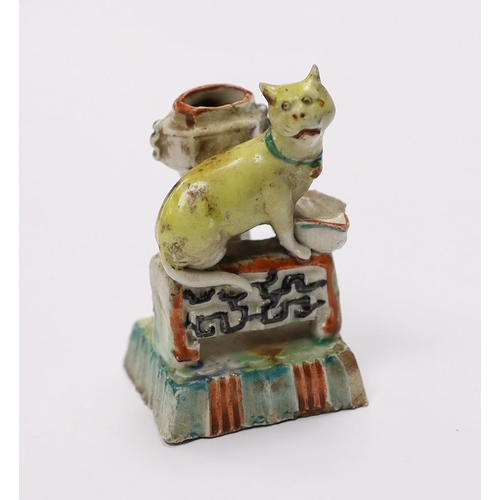 551 - An 18th century Chinese enamelled blanc de chine 'cat' joss stick holder, 7cm