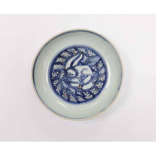 555 - A Chinese blue and white lion dog dish, Ming dynasty, 13.5cm