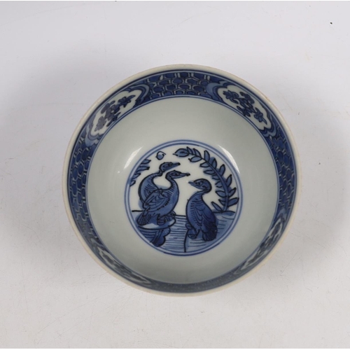 561 - A Chinese blue and white egrets bowl, Wanli period, 12cm diameter