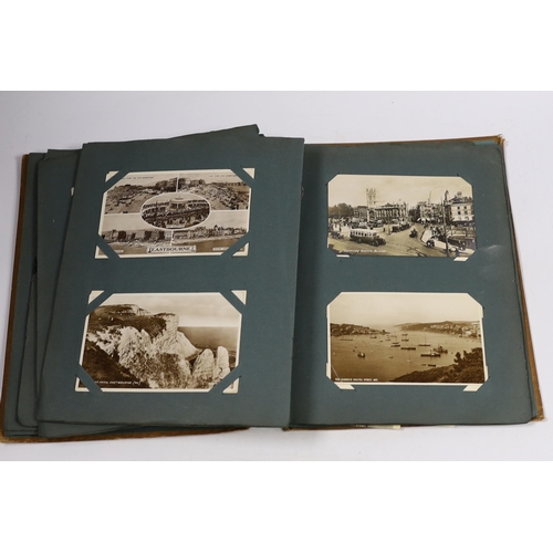 567 - A postcard album and various early 20th century postcards