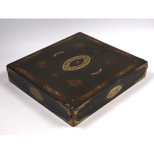 569 - A mid 19th century Chinese export lacquer games box, containing mother of pearl counters