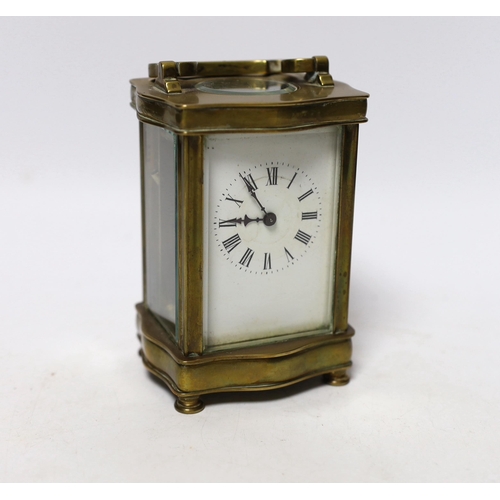 579 - A brass carriage timepiece 12cm high