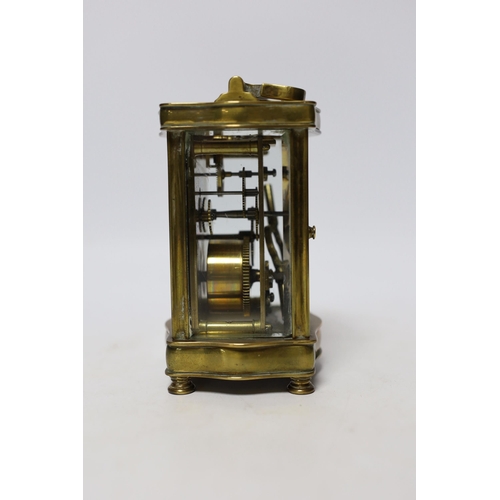 579 - A brass carriage timepiece 12cm high