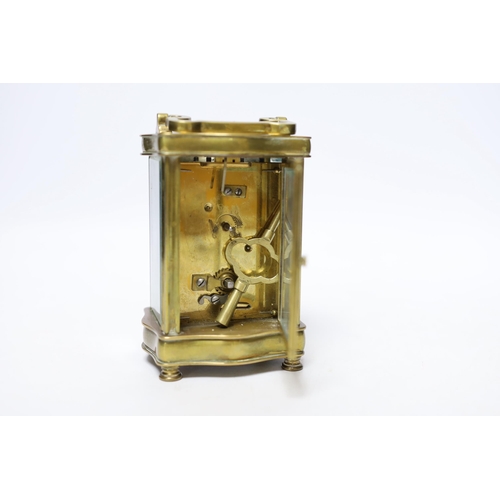 579 - A brass carriage timepiece 12cm high