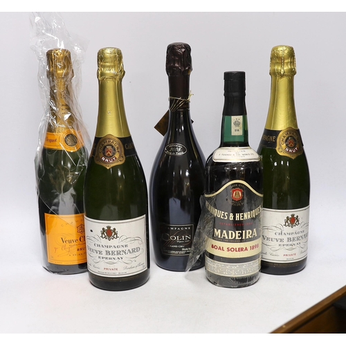 583 - A bottle of Champagne Colin grand cru, Veuve Clienquot, two bottles of Champagne Veuve Bernard, a bo... 