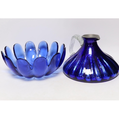 585 - A group of glassware including Small Tiffany vase, two Baccarat dishes and a large blue glass fruit ... 