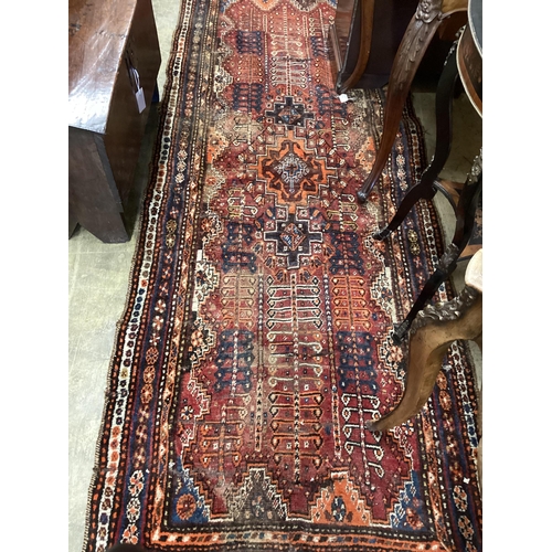 59 - A Belouch rug and a Caucasian runner, larger 260 x 100cm