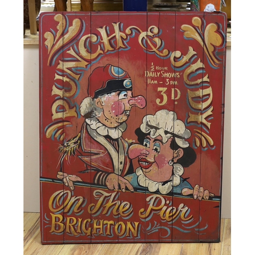 593 - A painted wooden advertising Brighton Punch & Judy sign, 90cm high x 75cm wide