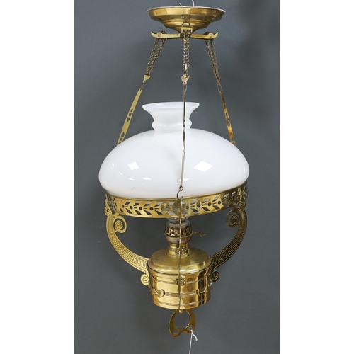 594 - A late 19th century German brass hanging lamp, with oil reservoir and opaque glass shade, approximat... 