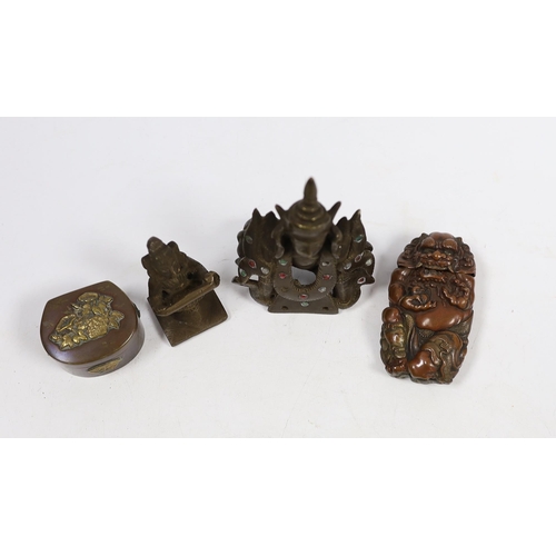 598 - A Japanese mixed metal Vesta case modelled as an oni, a similar box, a Thai bronze figure and an Ind... 