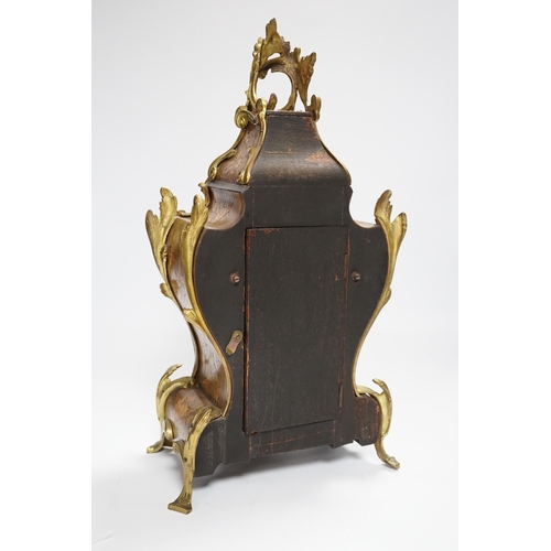 604 - A French gilt metal mounted rosewood and floral marquetry mantel clock. 40cm