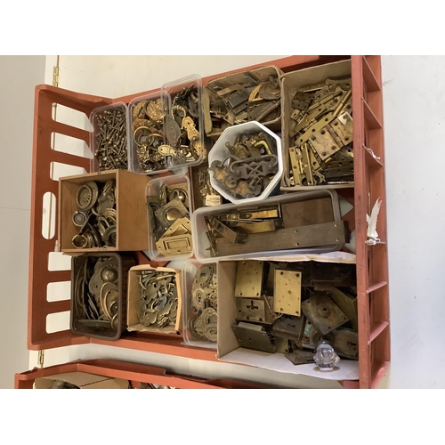 73 - A quantity of assorted furniture mounts, handles locks and fittings, etc.