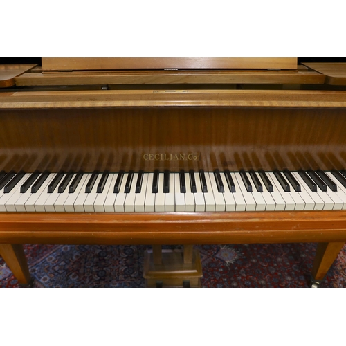 74 - A mid 20th Cecilian & Co mahogany baby grand piano retailed by Harrods Ltd