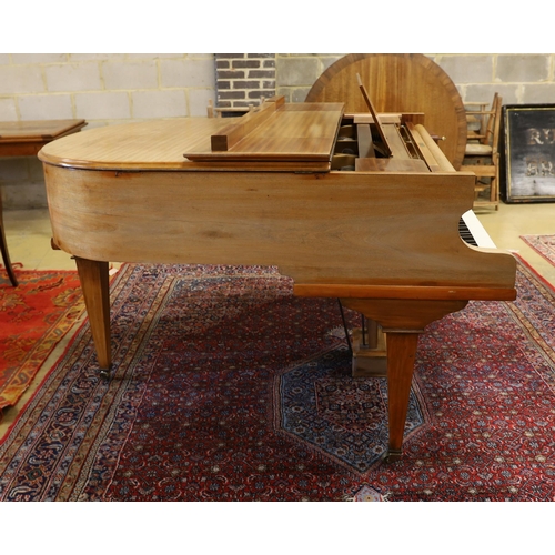 74 - A mid 20th Cecilian & Co mahogany baby grand piano retailed by Harrods Ltd