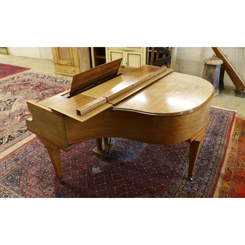 74 - A mid 20th Cecilian & Co mahogany baby grand piano retailed by Harrods Ltd