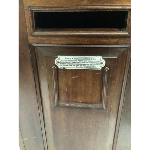 1002 - An early 20th century Hall Accessories Ltd., mahogany telephone/internal posting box, width 49cm, de... 