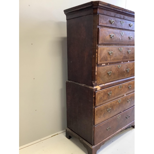 1016 - An 18th century feather banded walnut chest on chest, width 101cm, depth 52cm, height 173cm