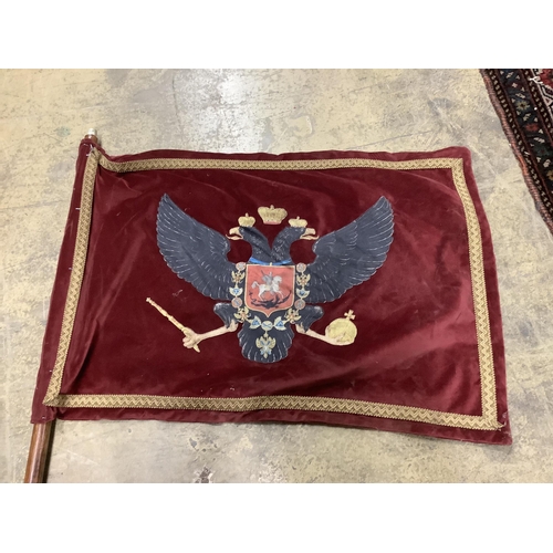 1023 - An embroidered flag and instrument box