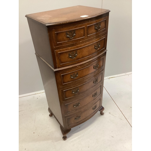 1035 - A reproduction walnut tall chest, width 48cm, depth 39cm, height 107cm