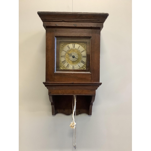 1039 - James Weston, Lewes. An oak wall clock, the 6.25in. dial with central subsidiary dial, height 53cm... 