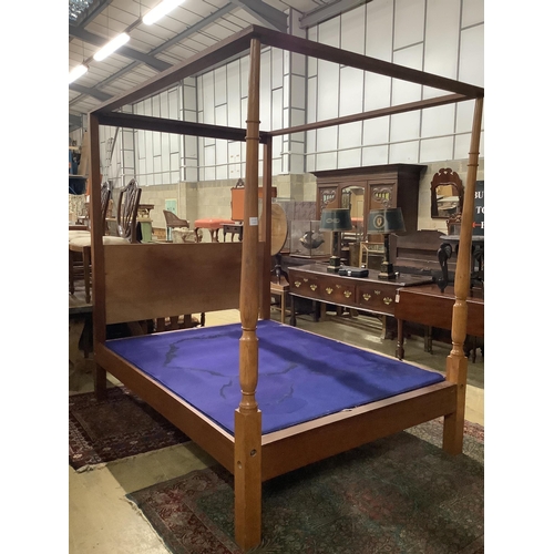 1041 - A George III style oak and mahogany four poster bed frame, length 215cm, depth 159cm, height 216cm... 