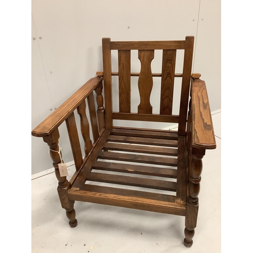 1046 - An early 20th century oak reclining elbow chair with Kilim seat and back, width 71cm, depth 78cm, he... 