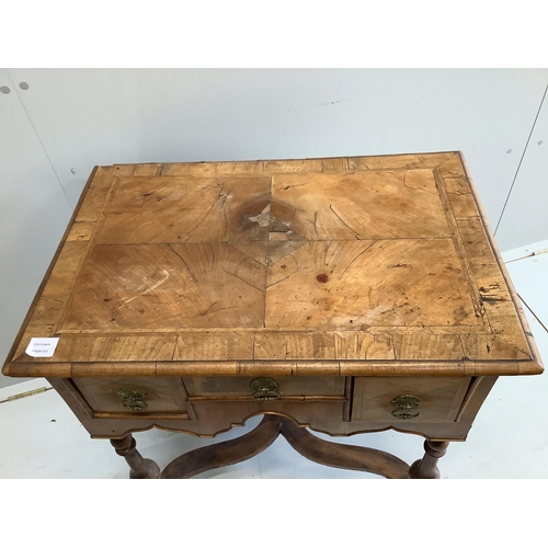 1081 - A small 18th century style feather banded walnut lowboy, width 73cm, depth 49cm, height 74cm