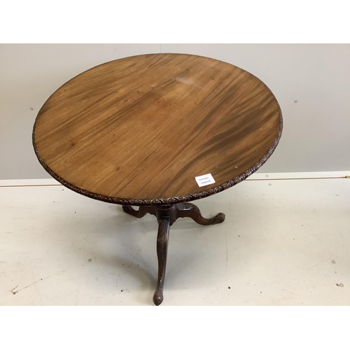 1083 - A George III style circular mahogany tilt top tripod tea table, diameter 76cm, height 72cm