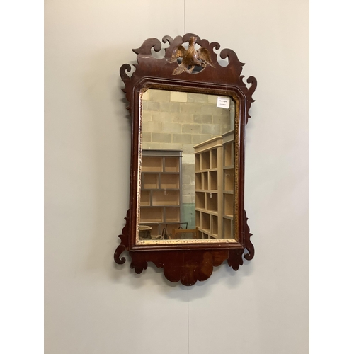 1131 - Two 18th century style walnut fret cut wall mirrors, largest width 55cm, height 70cm