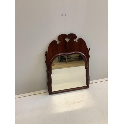 1131 - Two 18th century style walnut fret cut wall mirrors, largest width 55cm, height 70cm