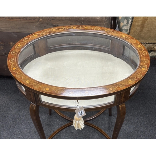 1165 - An Edwardian marquetry inlaid oval mahogany bijouterie table, width 61cm, depth 41cm, height 77cm... 