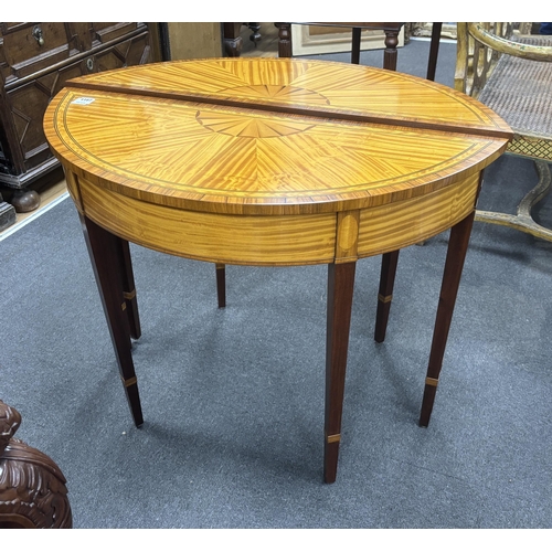 1167 - A pair of reproduction Sheraton style banded satinwood D shaped side tables, width 94cm, depth 39cm,... 