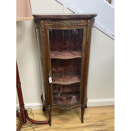 1173 - A Louis XVI style gilt metal mounted marble topped serpentine vitrine, width 70cm, depth 33cm, heigh... 