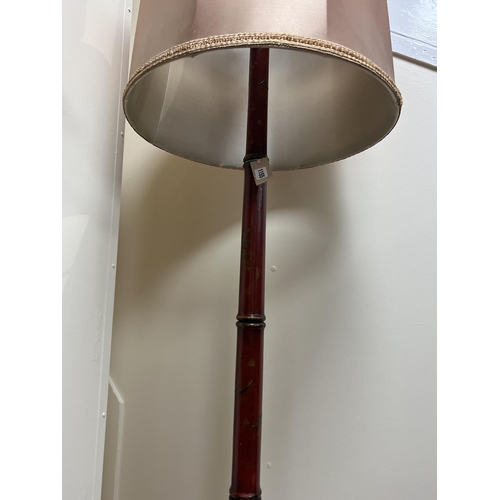 1174 - A chinoiserie lacquer faux bamboo lamp standard together with a giltwood standard lamp