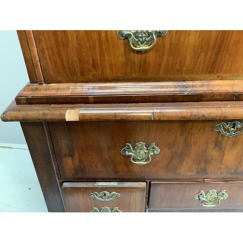 1177 - A George I and later feather banded walnut chest on stand, width 103cm, depth 58cm, height 167cm... 