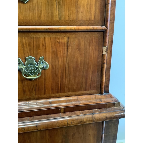 1177 - A George I and later feather banded walnut chest on stand, width 103cm, depth 58cm, height 167cm... 